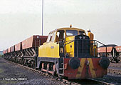 NCB Diesel Hydraulic Sentinel hauls a rake of empty HEA hopper wagons from the sidings for loading