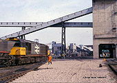 View of British Rail Class 58 028 is seen passing the rapid loading bunker at Daw Mill Colliery