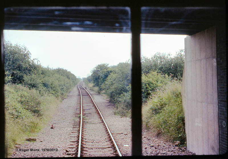 Looking east from the observation saloon as the train passed under the former A41 bridge at Burton Dassett