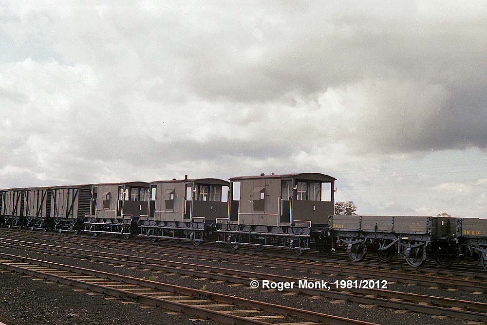 Newly overhauled internal rolling stock in the marshalling yard awaiting transfer over BR tracks to a Naval Depot