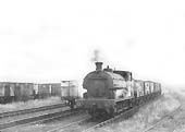 A Peckett is seen hard at work propelling wagons bunker first into the exchange sidings in late 1950s