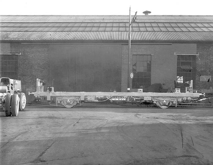A view of the side elevation of the Motor Brake Third Railcar's chassis outside of the works