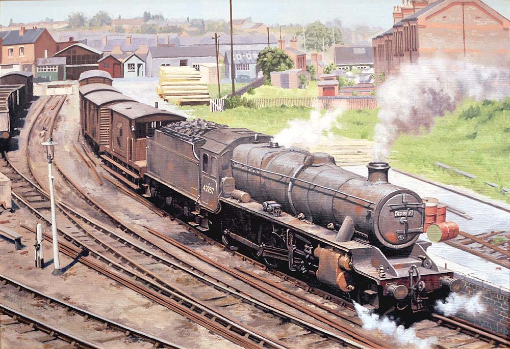 Ex-LMS Stanier Mogul 2-6-0 No 42957 is seen shunting in Stechford goods yard during the early 1960s