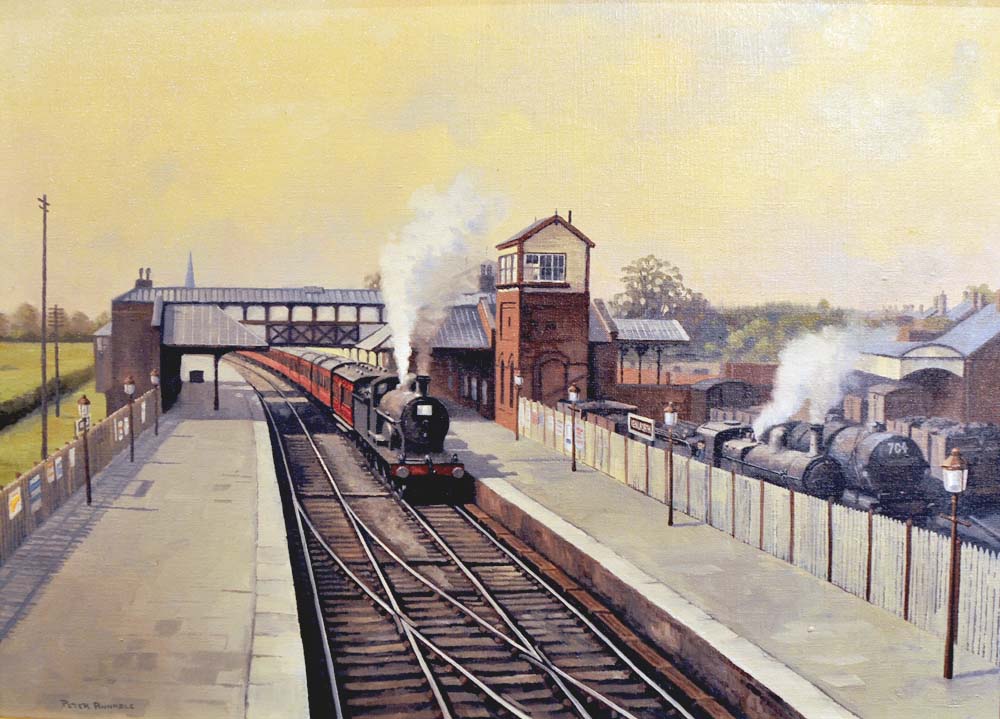 An unidentified George Fifth locomotive is seen arriving at Rugby station on a Northampton to Rugby service