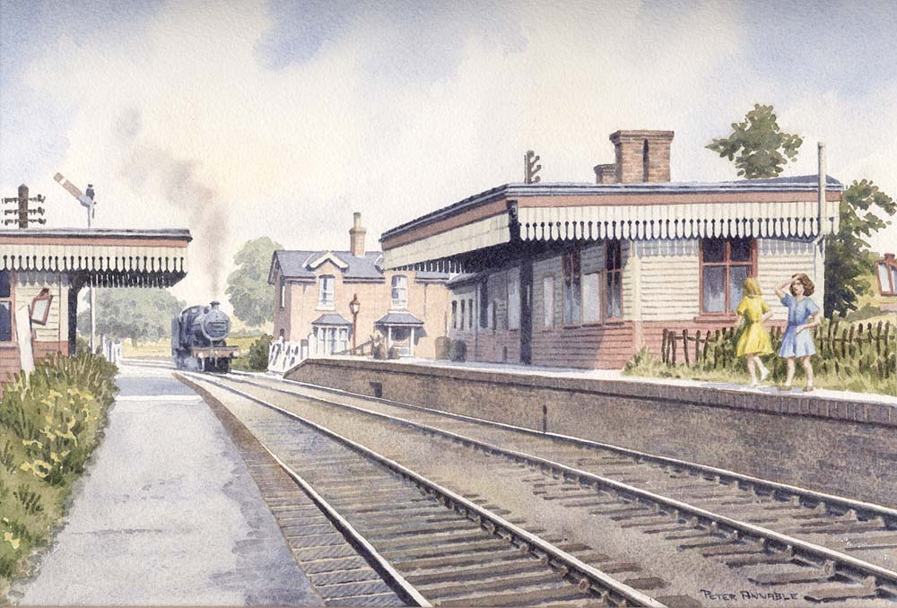 An unidentified George Fifth locomotive is seen arriving at Rugby station on a Northampton to Rugby service
